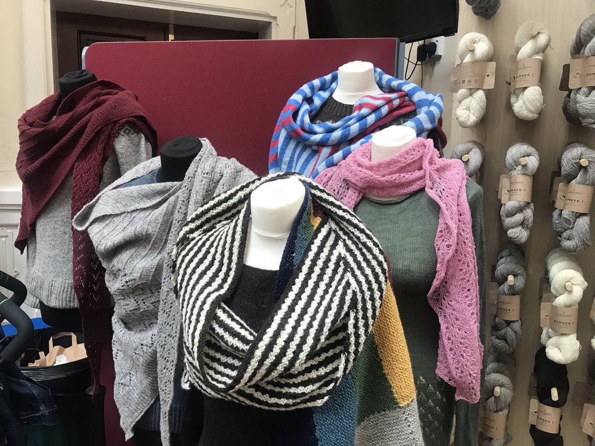 galoisgirl's tweet photo. Pretty shawls on display at the @GarthenorWool stand at @YarninghamFest this afternoon. https://t.co/5hrKCVXZfz