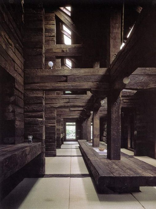 "Railway Sleeper House" by Shin Takasuga (1970). A giant communal living space, built out of interlocking railway ties. 