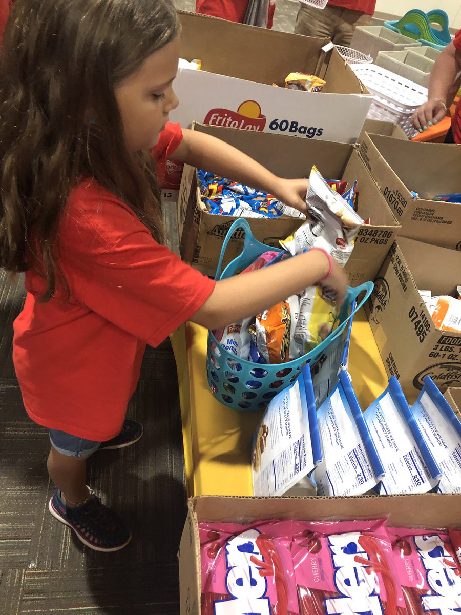 Packing goodie baskets for first responders this morning! #ServeDay19 #WeGetToServe