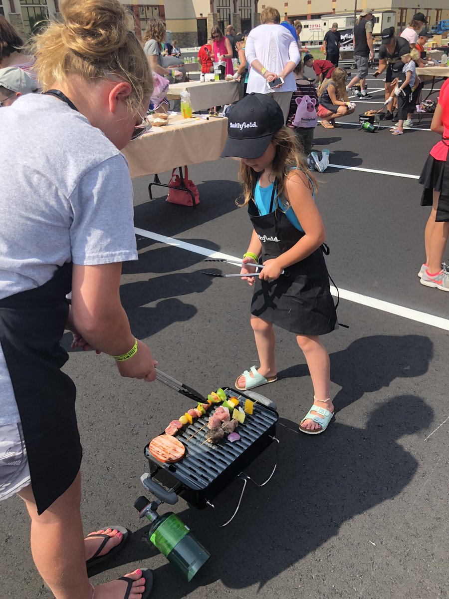 calliecporter's tweet photo. When your Daddy has a #pork conference, you get to have #grilling lessons. #NPIC #NPIC2019 https://t.co/KK6Atu0qrm