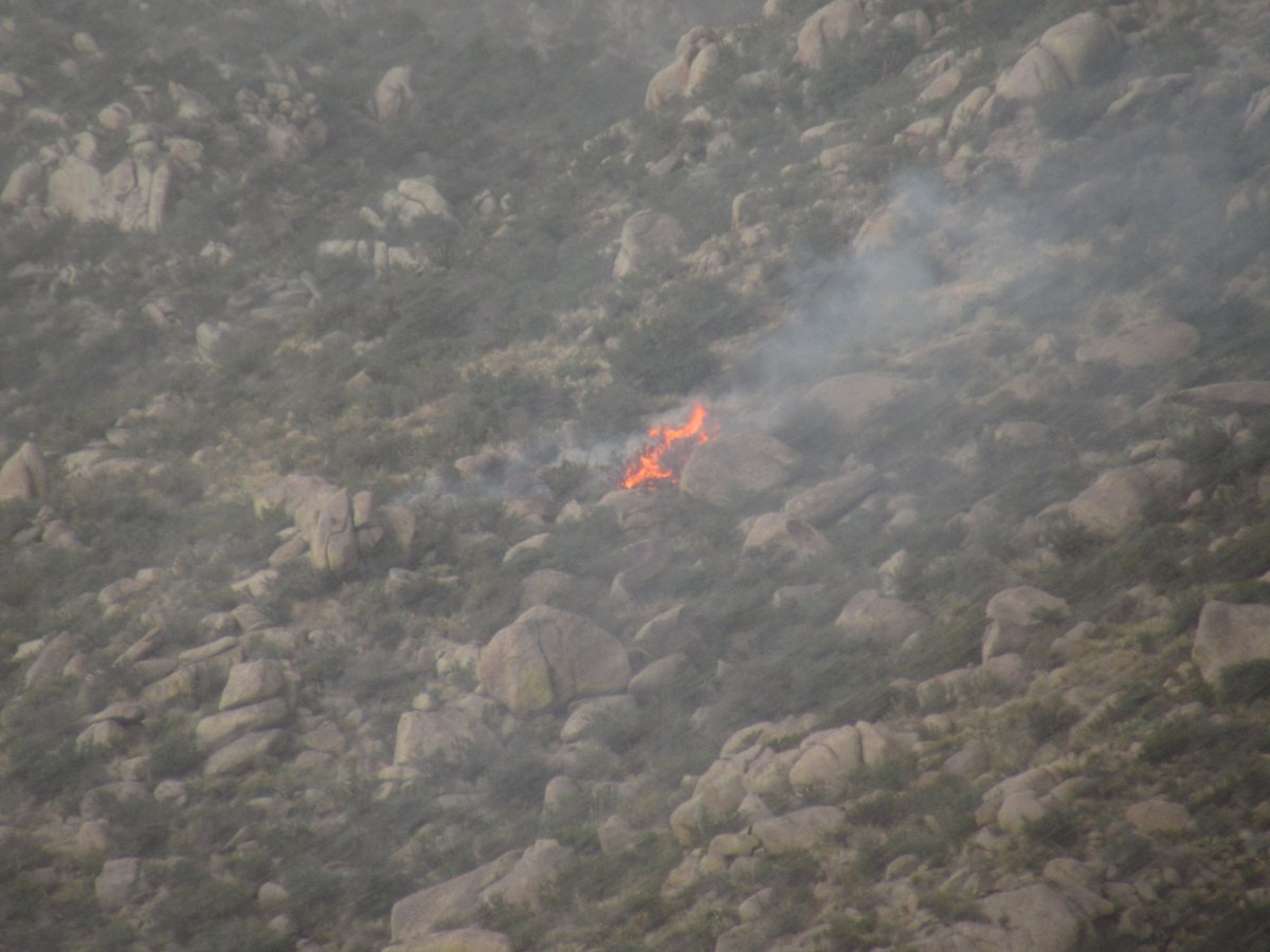 Fire caused by lightning strike above the Tram. We called 911, here are pics to show where it is @BerncoFire