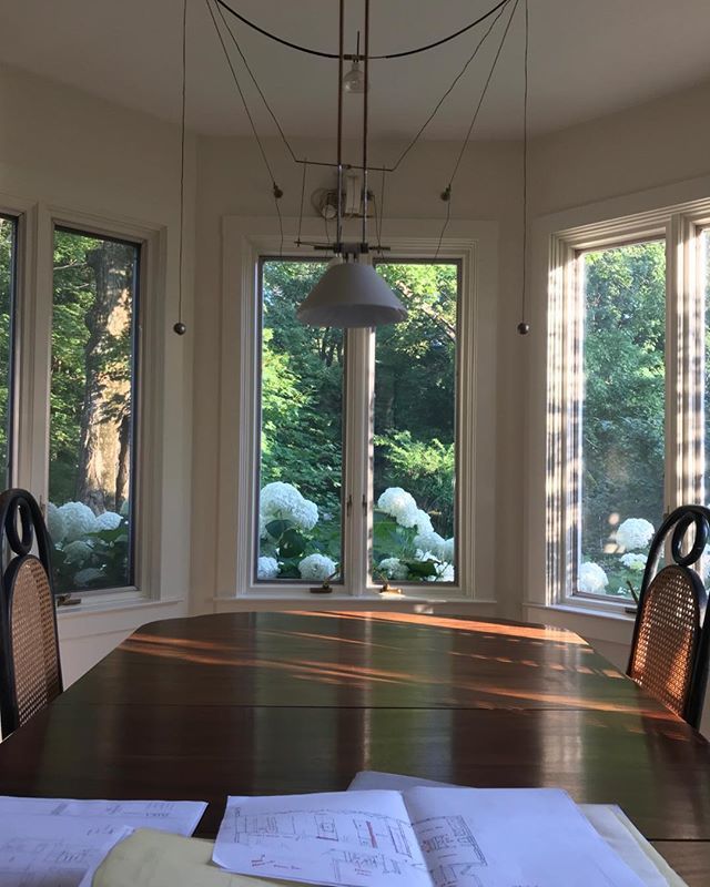 jmkarchitects's tweet photo. I never really hang out in the dining room at my house unless there is food and wine. Working in here today and sitting with some of my favorite possessions, antique Thonet chairs, one of the original yayaho light fixtures and looking out over large snowball sized hydrangea … https://t.co/hDjIlvBCa9