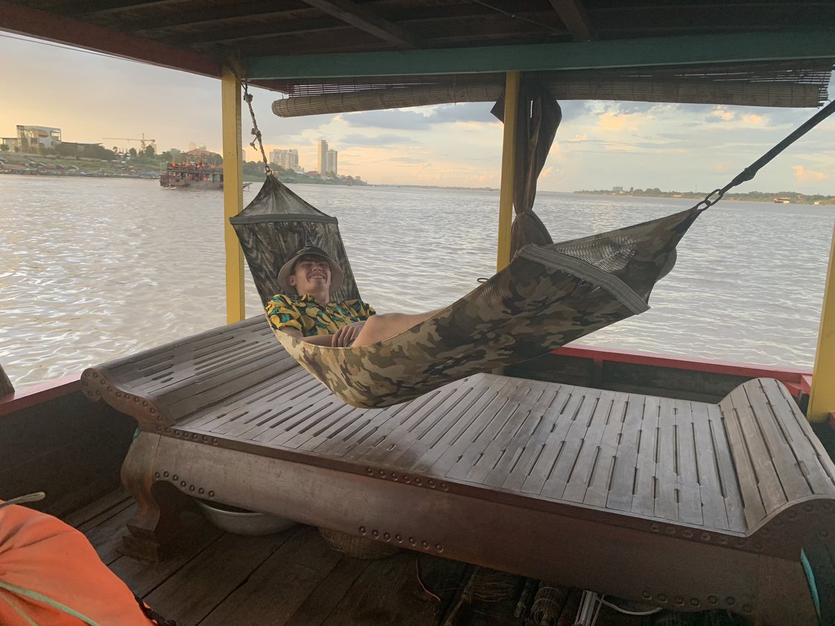RobGLloyd's tweet photo. Charades, relaxation and sunset on our #Mekong #PhnomPenh river cruise @WillinkSchoolUK @OutlookExpeds https://t.co/P6mmTLyQVr
