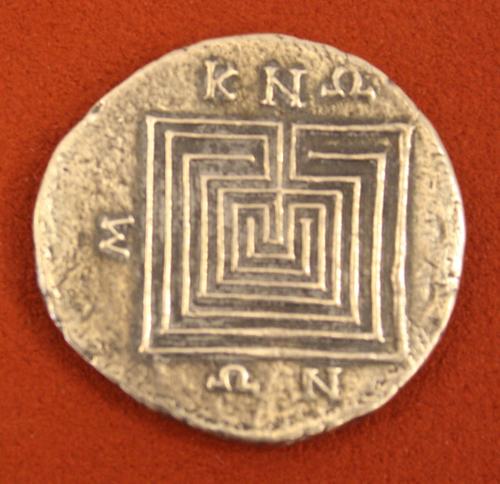 This meander pattern is apparently significant as far referencing the Maeander River in ancient Asia Minor/modern day Turkey. But it also could be a reference to the Minoan labyrinth.