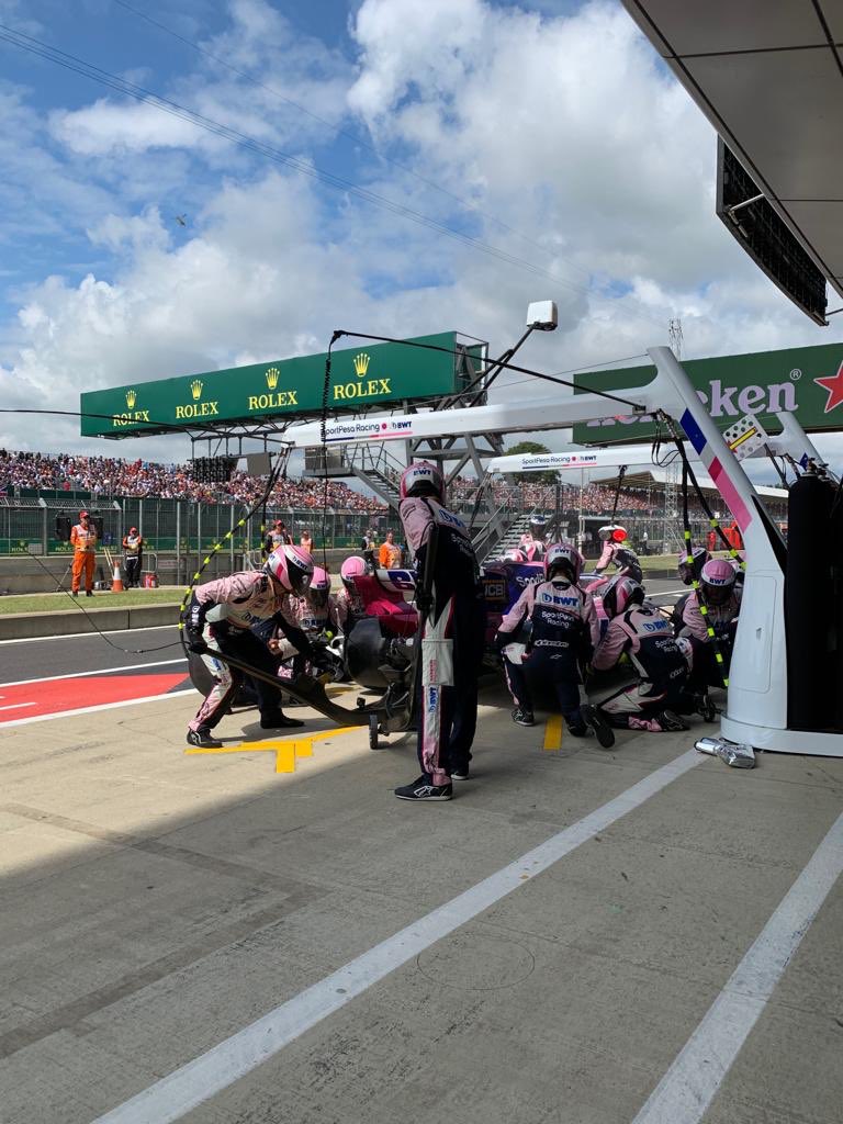 AstonMartinF1's tweet photo. BOX, BOX, BOX!!!

@lance_stroll in and out in a flash, Hard tyres now fitted 🤜🤛

#MakeItCount #F1 #BritishGP https://t.co/m2zwFsSxGm