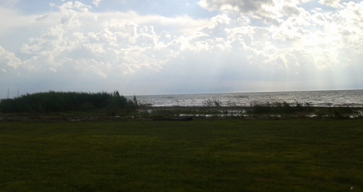 Cerridwensheart's tweet photo. I attended my first Pow Wow up on the beautiful shores of Lake Huron with @skeeterbums (who you can see in the background of the picture) with a lovely young Jingle Dancer. #KettlePoint #StoneyCreek https://t.co/YjNFr3zQFk