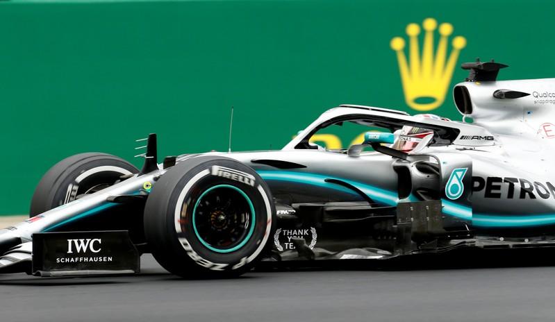 Reuters's tweet photo. Hamilton takes record sixth British GP win https://t.co/wcAS1YUuj3 https://t.co/2XHRwsWMSr