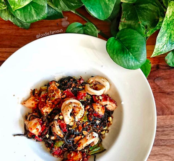 Have you tried our new Seafood Ink Pasta? The squid ink noodles are made fresh in-house and tossed in a light lemony sauce with grilled seafood then finished with shishito peppers and pistachios! It’s delicciousss🤤Try it this weekend at both locations🙌🏼