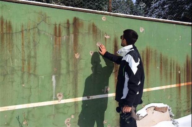 VSportsTM's tweet photo. Ahí empezó todo. El frontón que utilizaba Djokovic de niño con las marcas de la guerra en Serbia. Lo fue a visitar en 2014. https://t.co/RBLItxEhys