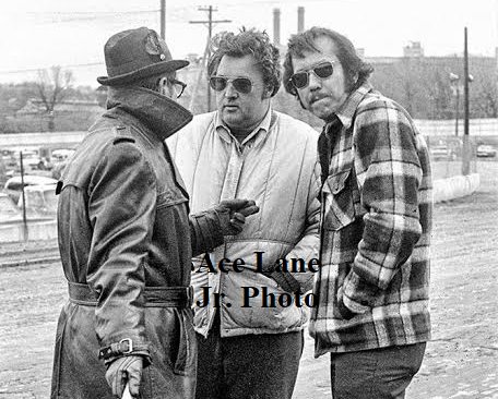 After just seeing <a href="/DaleJr/">Dale Earnhardt Jr.</a> podcast with Gary Balough, reminded me of this photo with Gary waiting on homestretch to apologize to Nazareth Speedway fans for flipping them off. (L-R) Promoter Jerry Fried, Owner Tony Ferraiuolo, and a less than enthusiastic Balough eyeing the crowd.