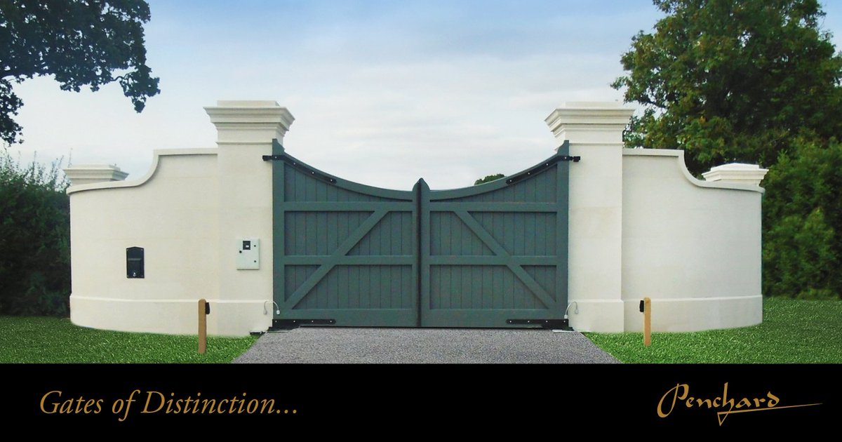 <a href="/PenchardUK/">Penchard UK</a> unique Koryde system hides all wiring for the automation inside the piers for a neat finish. Light stone wall, dark grey #Sapele painted gates, bespoke curved top hinges ...a stunningly symmetrical #entrance way.  #greygates #gateinstaller #automatedgates