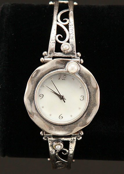 ZVUJewelry's tweet image. Mother of Pearl face, Swiss mechanism, and other semi-precious stones are what make our #CallofTime #watchofIsrael stay ahead of the curve. If you’ve the courage to carry this extremely #stylishwatches, feel free to drop in on zvuartisanjewelry.com/product/call-o…