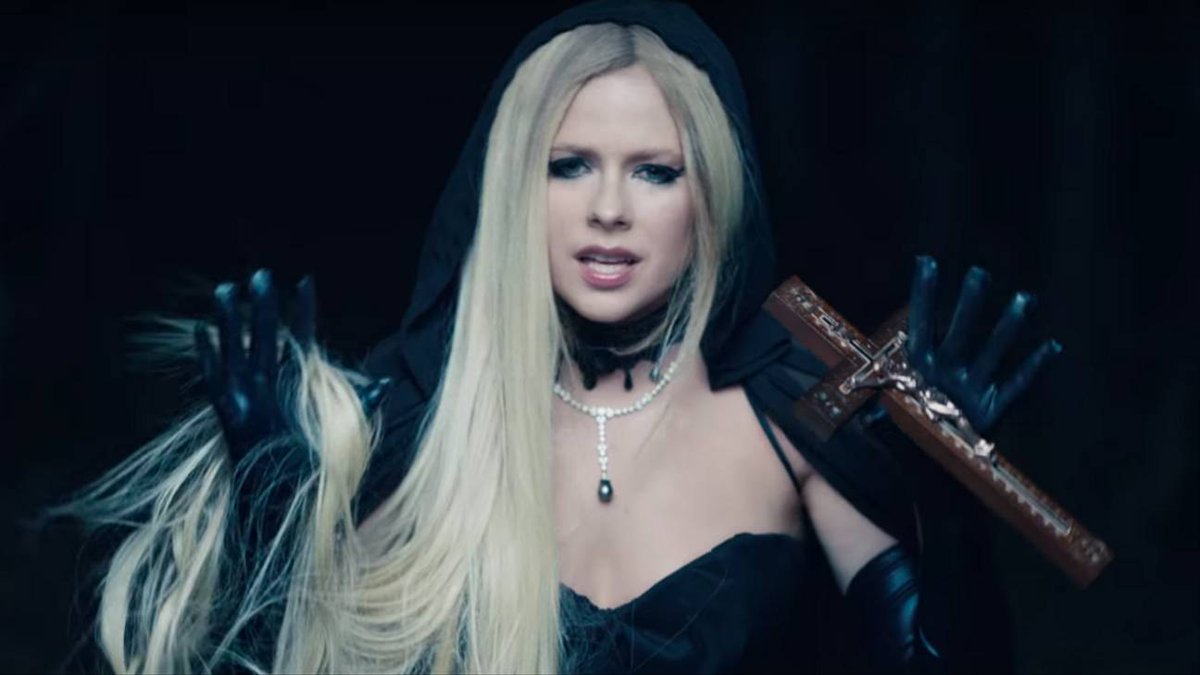 MTV's tweet photo. .@AvrilLavigne gives us ALL the evil glamour in her #IFellinLoveWithTheDevil video: https://t.co/B6YsPSD50k 🖤 https://t.co/pB8woZcct1
