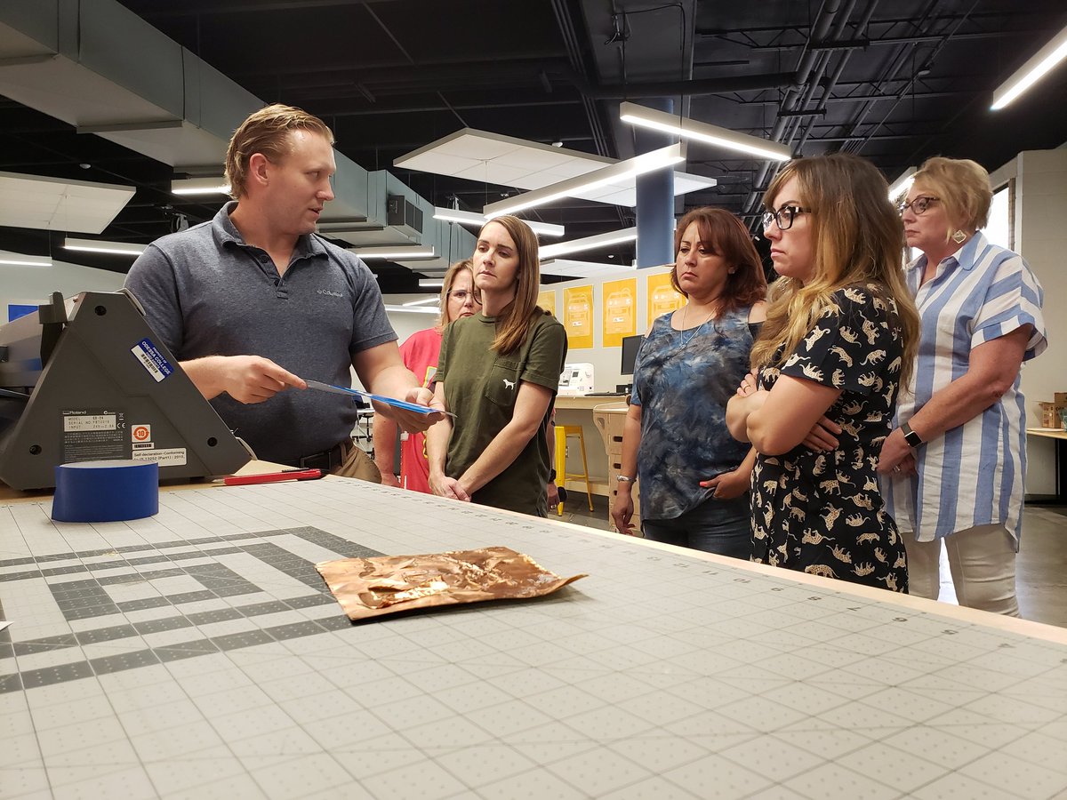 fablabpermian's tweet photo. Mr. Nick. Harrison demonstrating the use of CAD and the Roland Desktop Sign Maker during the @EctorCountyISD teacher professional development. #FabLabPermian #design #tshirt #steam #teacher https://t.co/AhUDkTLtVJ