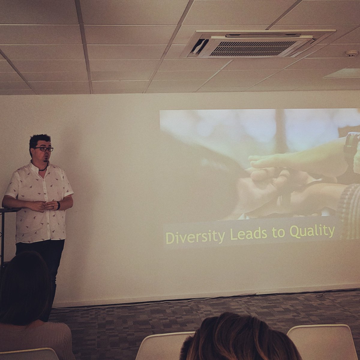 Rosicadia's tweet photo. Callum Akehurst-Ryan speaking at tonight's @ministryoftesting meetup. Having a diverse range of backgrounds matters. Who is going to ask the question "What about civil partnerships?" when your work force is completely homogeneous. It's's good to be different in #testing #MOTNCL https://t.co/u7EvYGIg0B