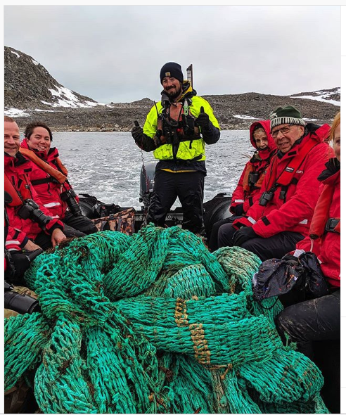 g_expedition's tweet photo. On Virgohamna #Svalbard our guests worked with our staff to remove this massive fishing net from the beach! #CleanSeas #CleanUpforSarah #CleanUpSvalbard - we hope there will be less of these #ghostnets killing wildlife. https://t.co/YKNvZhiXEm