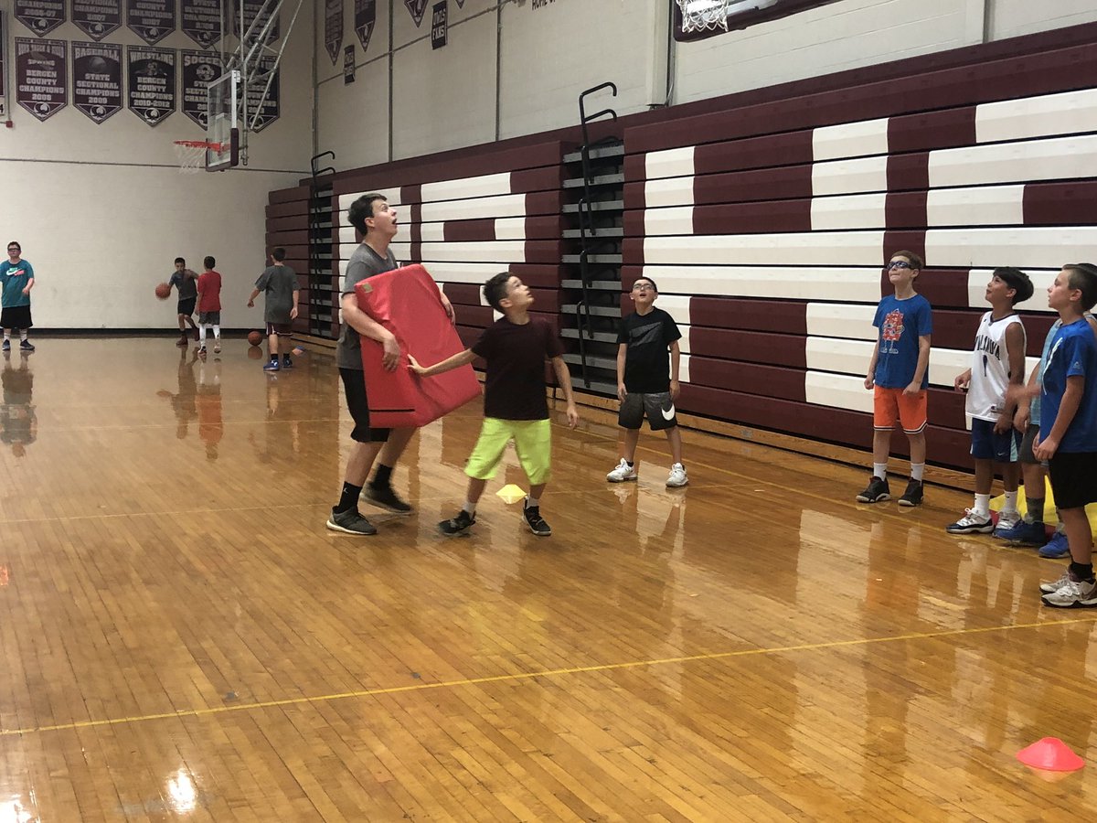 PRHoopsCamp's tweet photo. What a great day at PR Hoops camp. Young players working hard to get better. It’s always great to have so many kids looking to improve their games. Also nice to have current players and alumni working in their community and giving back https://t.co/CWzwGsWg69