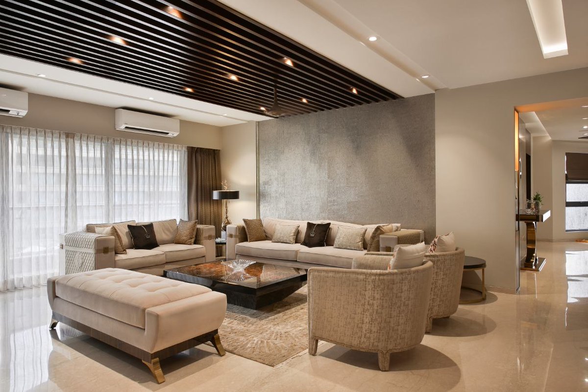 milindpai's tweet photo. This home abounds with an array of textures, colors, and materials. The Italian marble flooring blends well with the rustic textured wallpaper, which enhances the grandeur of the living room. Minimalist custom designed furniture adds a little touch of contemporary-modern feel. https://t.co/KY8aS39tP7