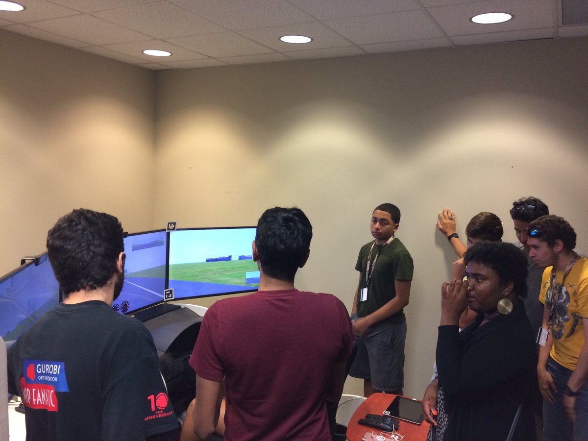 CCATPurdue's tweet photo. Shubham Agrawal, Seyedali Ghahari, and Mahmoud Tabesh showcase @NEXTRANSPurdue's driving simulator in a K-12 outreach event @PurdueEngineers.
#MinorityEngineeringProgram and #MITE's students enjoyed driving with the #AutomatedVehicle simulator and had a unique experience. https://t.co/HwYFDbRpaw