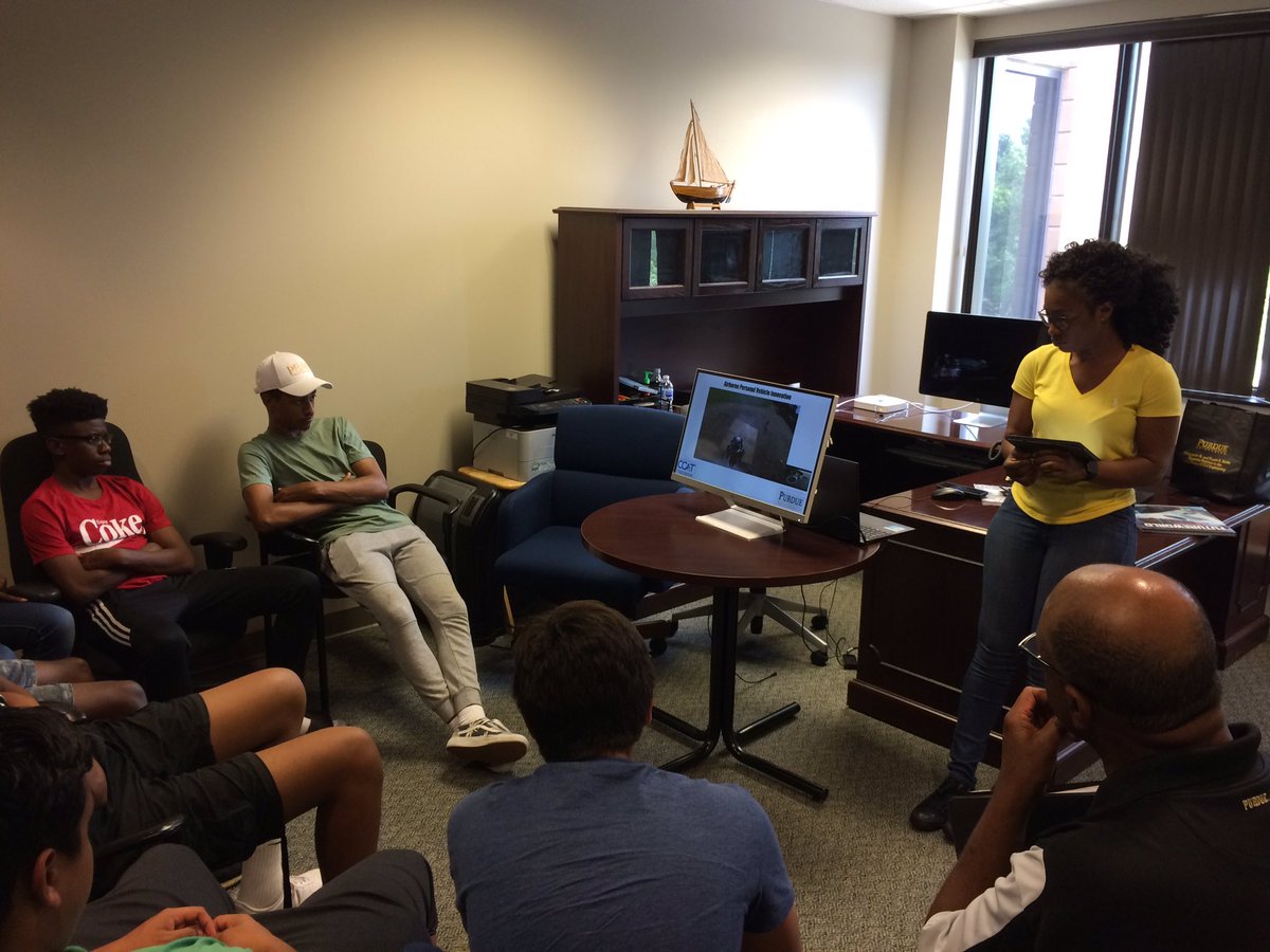 CCATPurdue's tweet photo. Naa Alabi presents her findings on #Airborne #Vehicles. Special thanks to the #MinorityEngineeringProgram and #MITE who gave us their time to visit @NEXTRANSPurdue and learn more about #Autonomous #Vehicles https://t.co/Sr8gQ52VWj