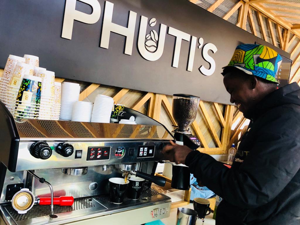 Phuti the Barista is so popular and his coffee is so good that The African Bank named the shop after him 😱 #JoburgsBestBarista
