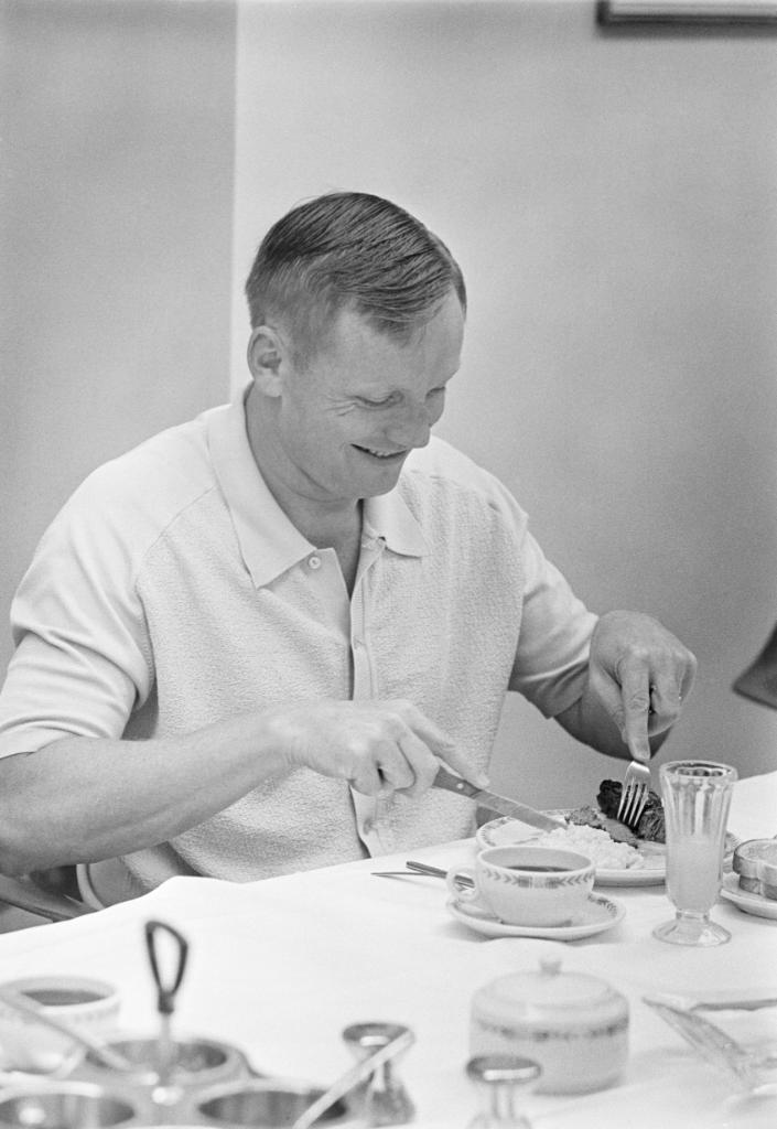 Neil Armstrong eats breakfast before the Apollo 11 launch