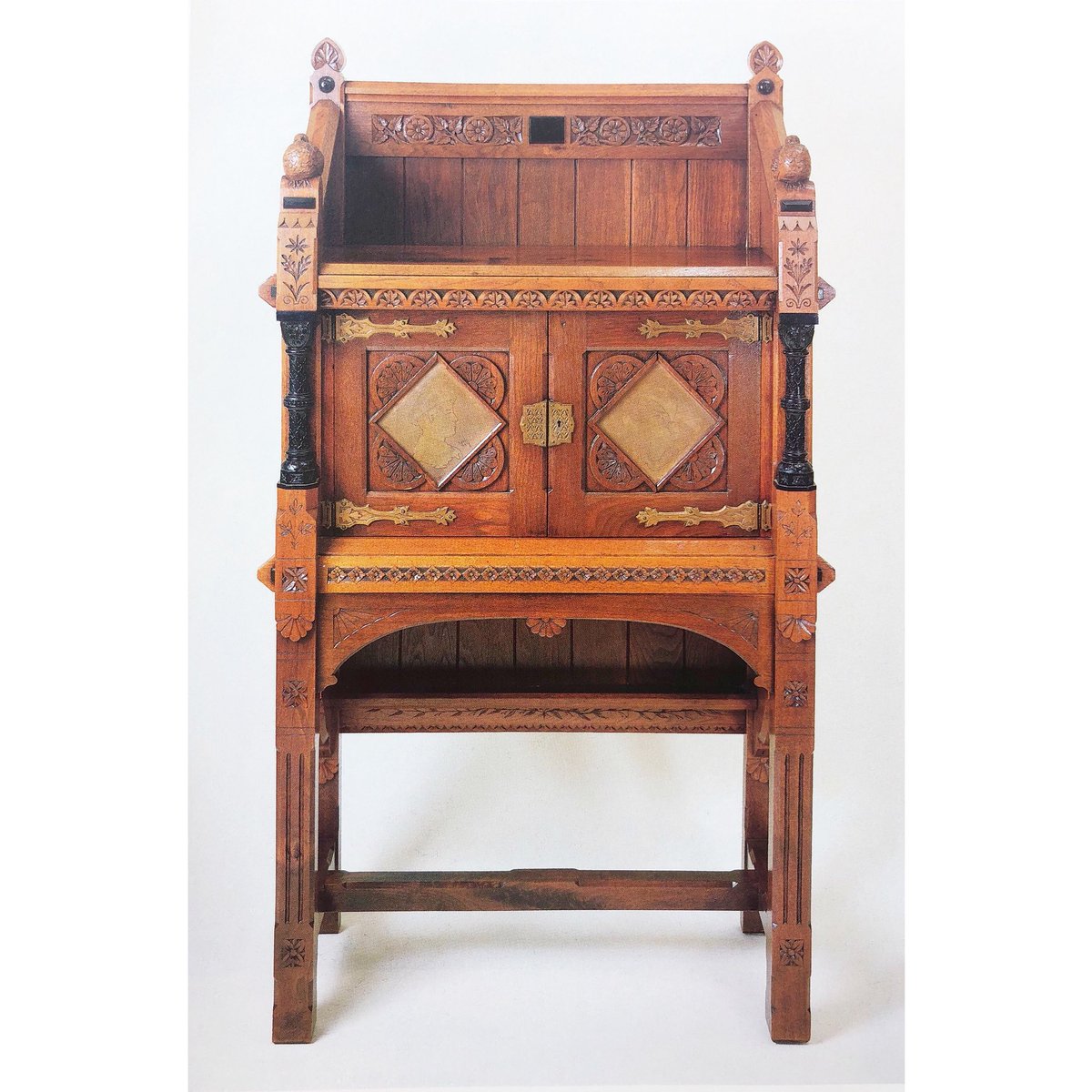 AntiquesMag's tweet photo. #antiqueoftheday Mary Louise McLaughlin, standing desk, 1876. Walnut and ebony. Shown at the Philadelphia Centennial, this is a great example of the enthusiasm for woodcarving that swept Cincinnati at the time, particularly among elite amateur women. #marylouisemclaughlin https://t.co/S2higdDZri