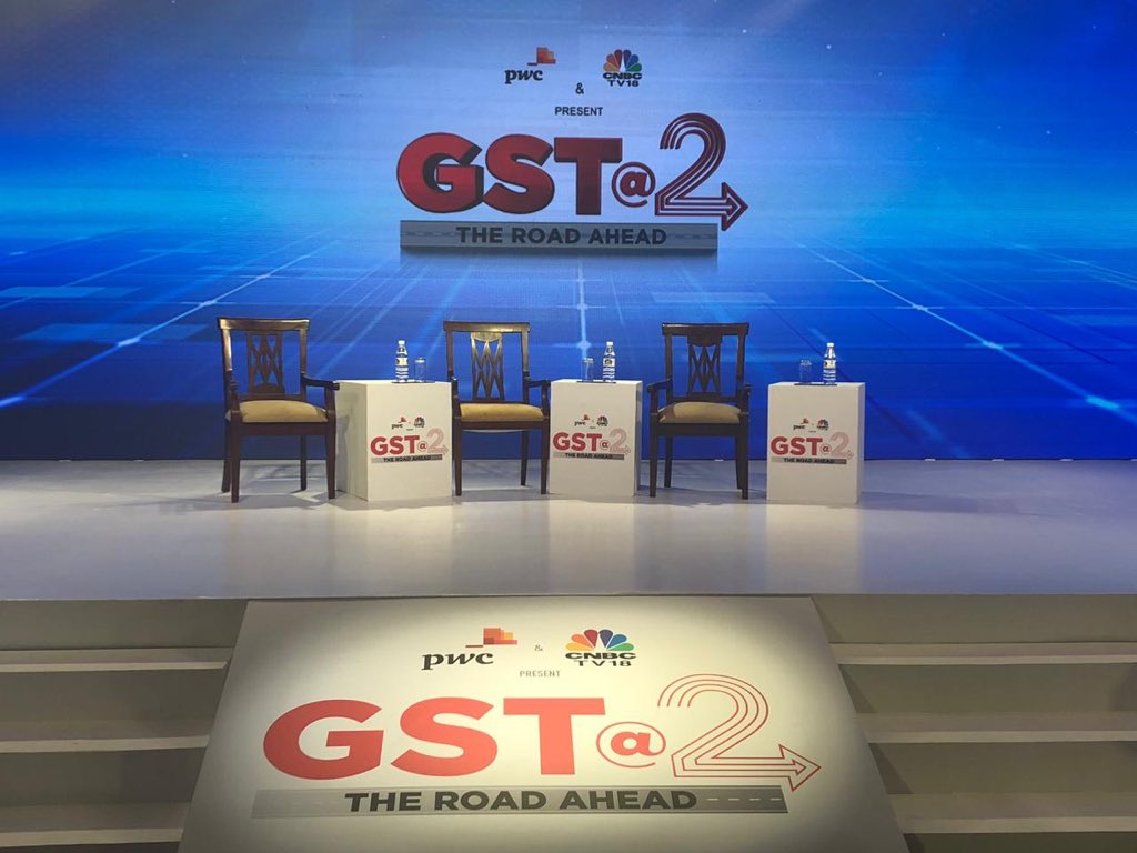 PwC_IN's tweet photo. The stage is set! An evening of insightful discussions is in store on one nation, one tax. Stay tuned for highlights from #GSTAtTwo presented by PwC And @CNBCTV18News #GSTwithPwC https://t.co/EeGZ3sG2GY