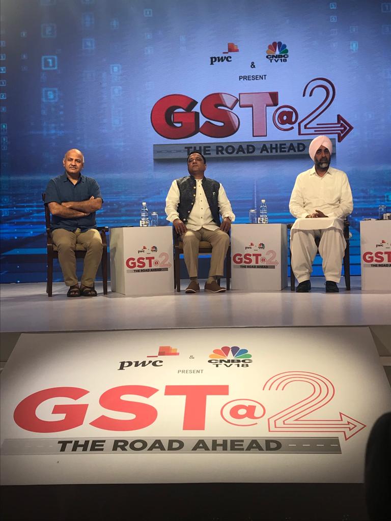 PwC_IN's tweet photo. The members of the GST Council taking stock of the impact of GST and its hits and misses at #GSTAtTwo. Watch it live: https://t.co/bKMxr9DBBk #GSTwithPwC https://t.co/2PThrGl1C9