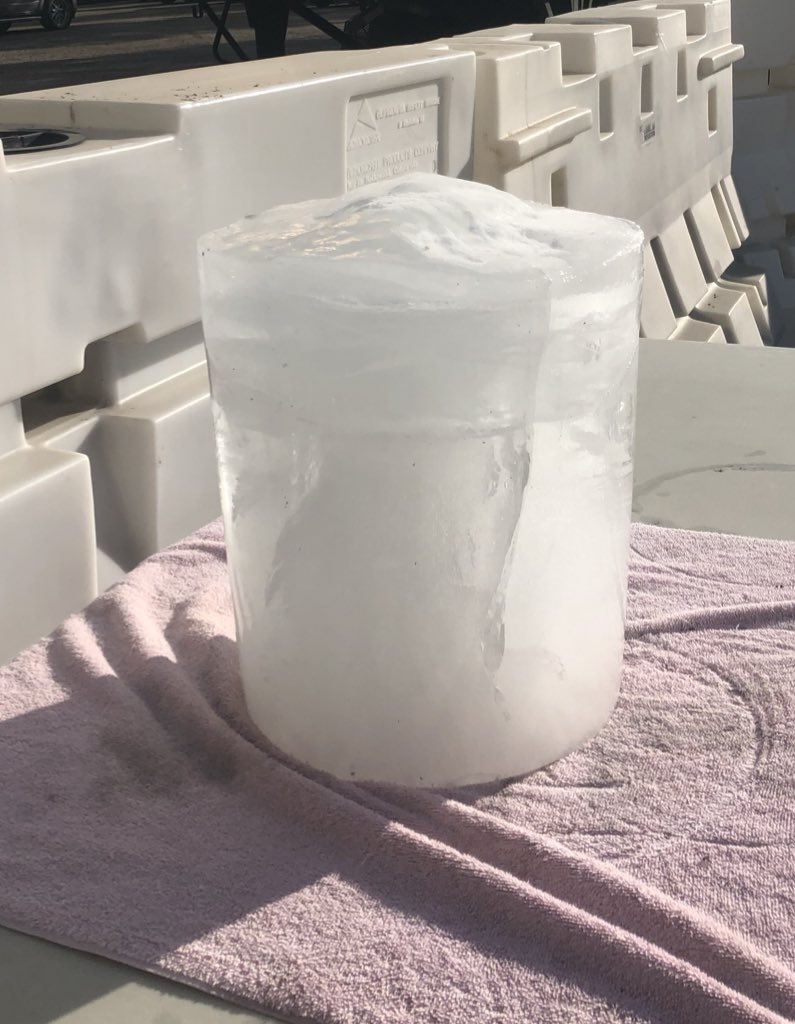 JaredStoneman's tweet photo. Turn up the heat on Slips/Falls! Inside this block of ice is a UPS Shield. What time of day do you think the sun will reach our shield? #SlipsFalls, #hydration, #NPSafetyAware. @TJMinneapolis @msp2tjs https://t.co/tL4C1o5mMH