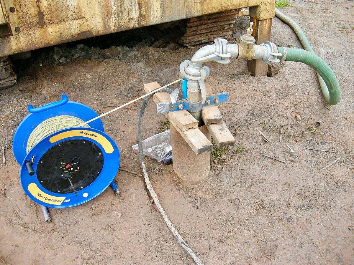 GeoscienceEA's tweet photo. Set-up for an abstraction #borehole pumping #groundwater for 7 days from a #sandstone #aquifer during constant rate #pumpingtest Water level meter used to manually dip groundwater level via dip tube verifying down-hole pressure level sensor & logger measuring levels every 15 secs https://t.co/AhMIa9AeCL