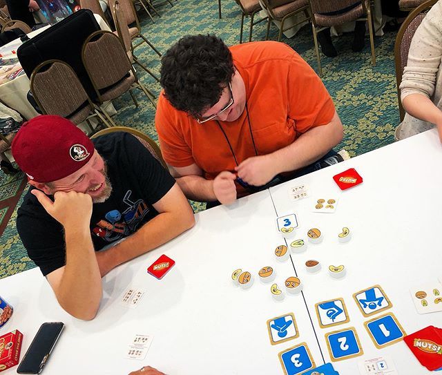 Colcakes196's tweet photo. The stress is real!! 😆 Nut So Fast from @smirkanddagger is so much fun! We just had to break it out to show some people at Dice Tower Con. Such a fun and silly speed game! #nutsofast https://t.co/1ABBqvwwz5 https://t.co/Yhbl3DFooJ