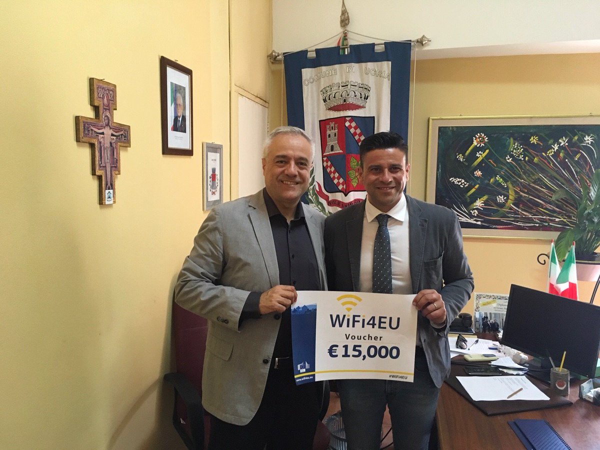 connectivityEU's tweet photo. Today, Franco Accordino visited the municipality of #Ucria 🇮🇹 and met Mayor Vincenzo Crisà to hand-over a #WiFi4EU voucher. Mayor Crisà shared plans to install WiFi4EU hotspots📡 in schools, museums, the central square, and any location where youngsters gather! https://t.co/0933hhBw1d