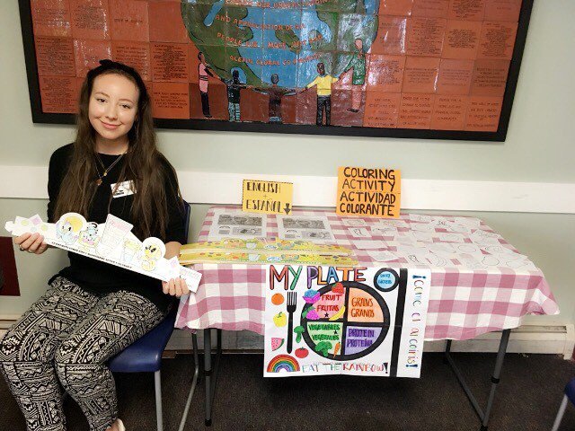 peoplesrc's tweet image. PRC's @TysonFoods intern, Mariah, led her first nutrition activity last week! She set out coloring sheets of produce for kids  &amp;amp; then had them hang the masterpieces on a poster. The kids (&amp;amp; parents!) loved having something to do while waiting! 

#TysonCommunities #CampusCompact