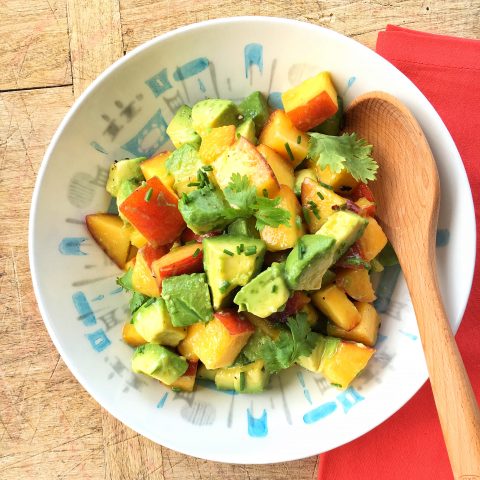 Peaches are at their peak, so use them in this summer-inspired Peach and Avocado Sunshine Salad. Easy to assemble with lemon juice, EVOO, chives, and cilantro. #salad #summer #avocado #peaches  lizshealthytable.com/2016/07/13/pea…