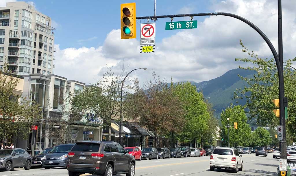 CityOfNorthVan's tweet photo. Lonsdale drivers, heads up. New – no more left turns on Lonsdale at 15th. Too many crosswalk pedestrian injuries there. So, no left turns northbound or southbound on Lonsdale at 15th.  Thanks! #NorthVan https://t.co/sSQ7dEoOSh