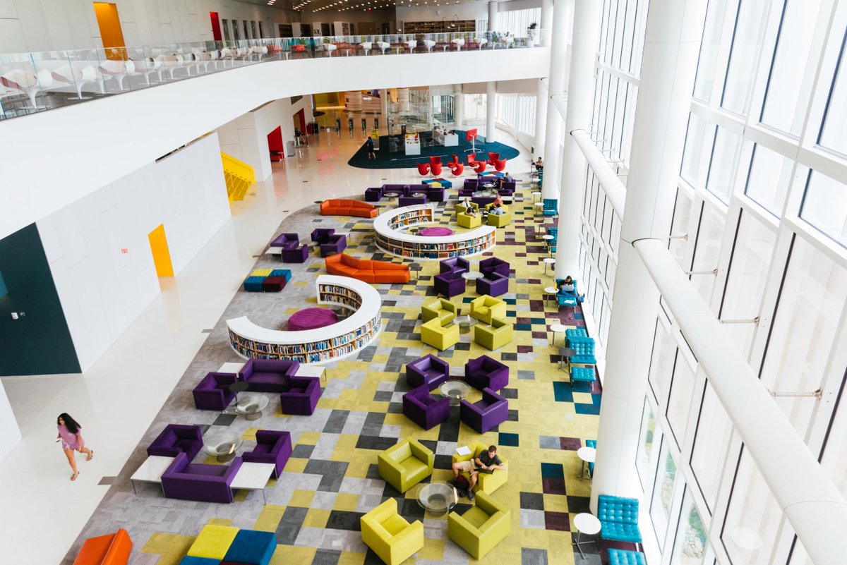 umsi's tweet photo. The shiny new James B. Hunt Jr. Library at @NCState uses a robot (named #bookBot) to deliver books to library patrons, @qz reports ➡️https://t.co/IEDaMQOhnw https://t.co/tXNGLF02RX