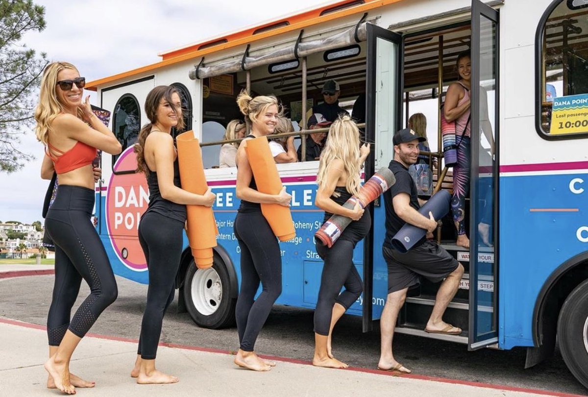 CityofDanaPoint's tweet photo. The iheartyoga crew is off to class on the #dptrolley! Remember to share your ride with us on social for a chance to be featured and receive a Squishy Trolley! #DiscoverDanaPoint https://t.co/IiqrXDjbTP