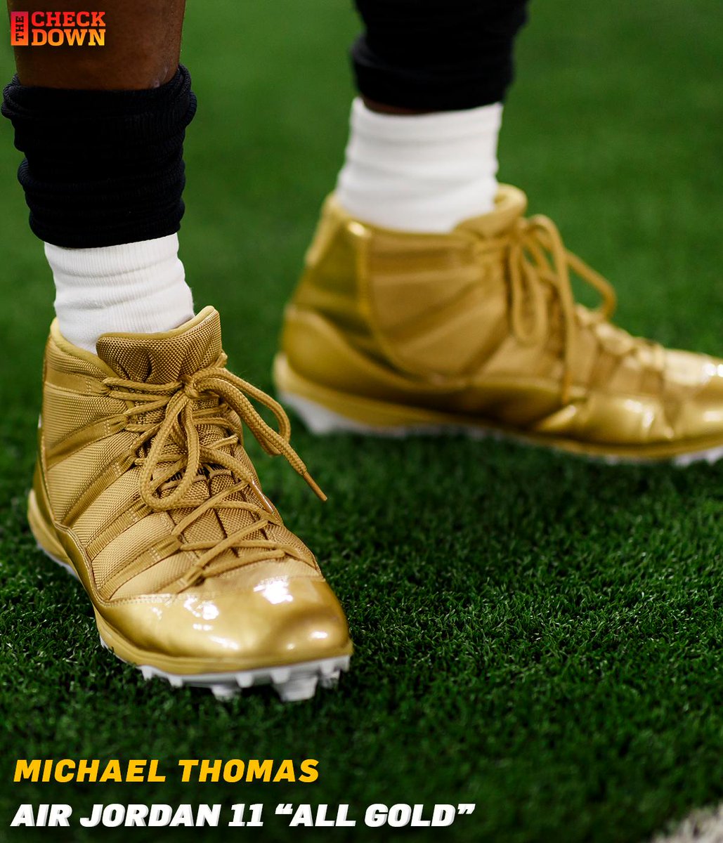 gold jordan cleats