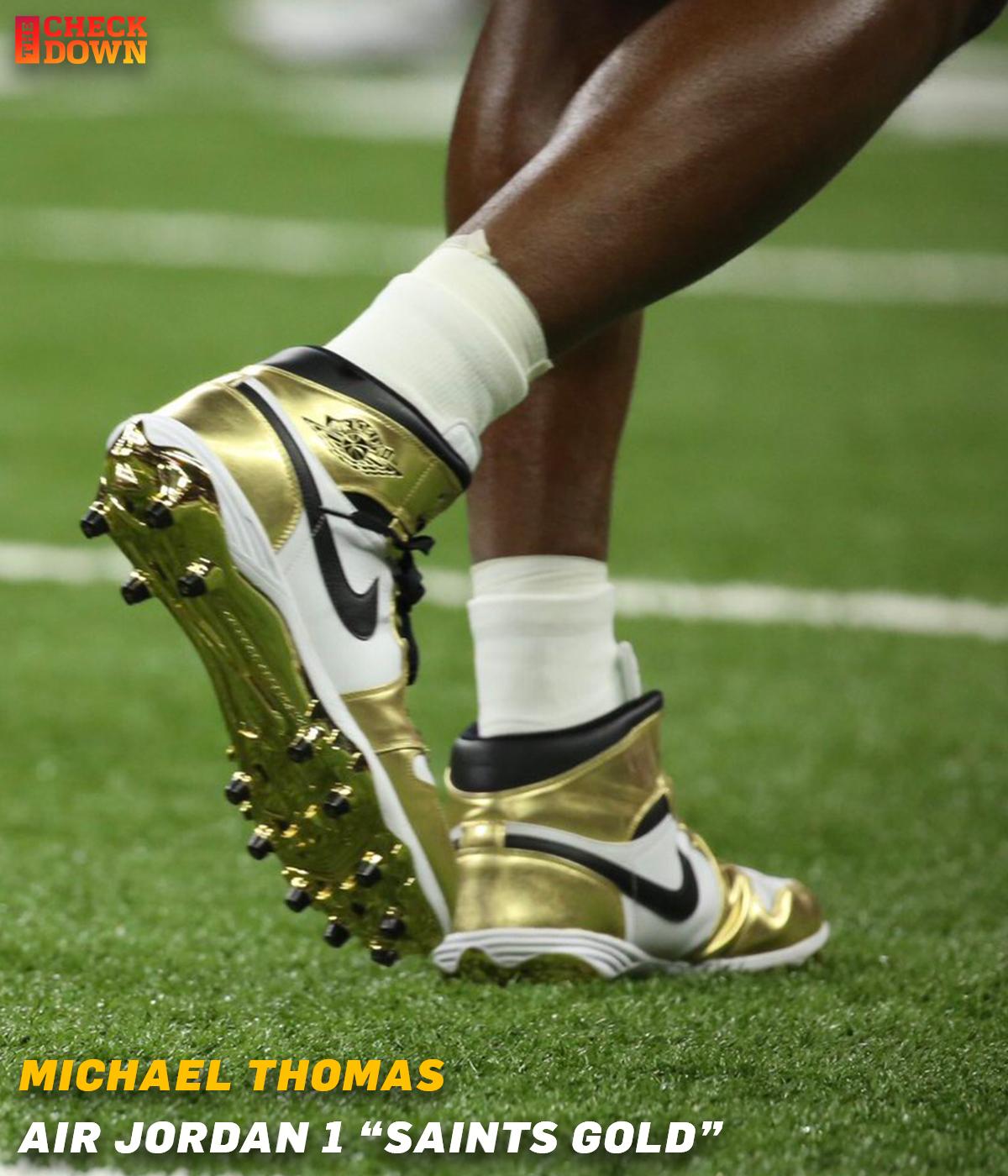 gold jordan cleats