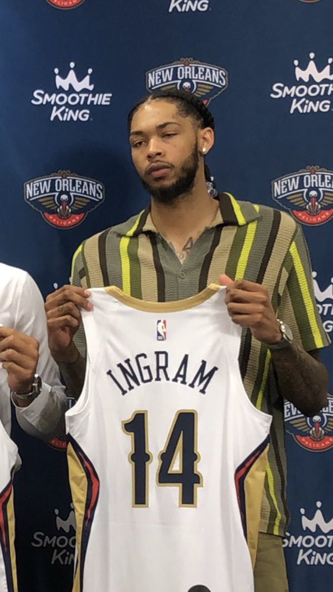 “Hold up the sweater grandma got you for Christmas. Go ‘head now smile!”