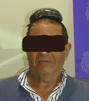 Complex's tweet photo. Police in Spain arrested a man in Barcelona's international airport for allegedly trying to hide over $30,000 worth of cocaine under his wig. 

➡️ https://t.co/aea0NEMS2j https://t.co/EyR8Foo8pj