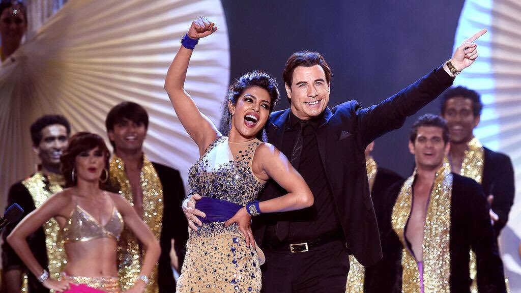 borderlyhq's tweet photo. #18DaysOfPC a performance. 

@priyankachopra and John Travolta perform at the 2014 IIFA. https://t.co/AL2GlJ6Py2
