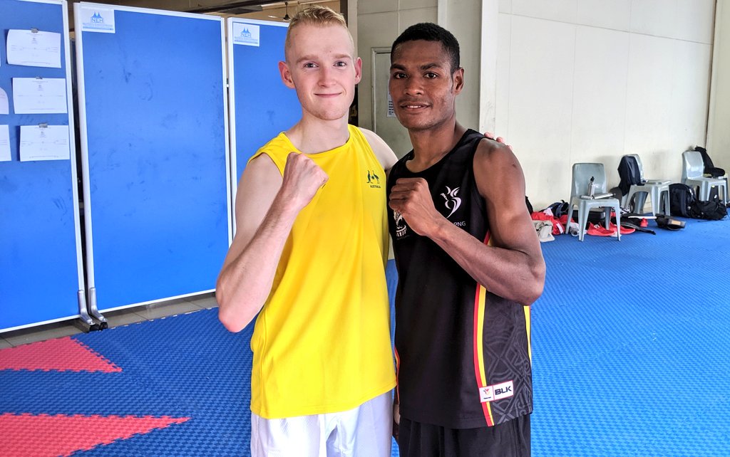AUSOlympicTeam's tweet photo. Mackenzie Singleton & Bobby Willie from PNG delivered the fight of the day at #Samoa2019! Both fought to the absolute dying second with Mac winning by 1 point.
Huge congratulations to both athletes - not only a great fight, but an inspiring display of sportsmanship #OneInSpirit https://t.co/sa0KU4ZvcM