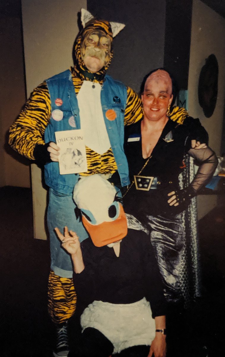SocksFur's tweet photo. Doing a longshot.
This pic was taken at DucKon 4 in 1995. I'm the tiger. I'm looking for whoever the Klingon and the Duck are in this picture because I think they'd want to see it.
Anyone know who they are / might be?
#Cosplay #DucKon https://t.co/2xAglGqWrX