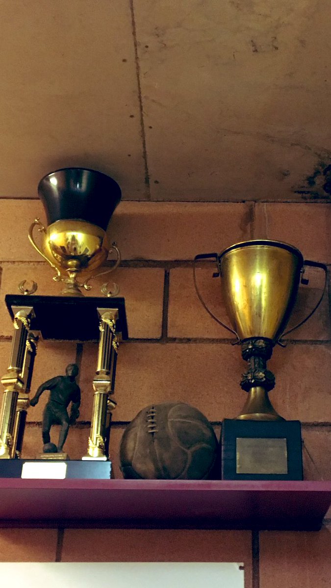 CEBesalu's tweet photo. Enmig de les copes històriques del Club, hi tenim una pilota dels anys 40, quan el camp de futbol era sota el pont. https://t.co/qR7g5habhz