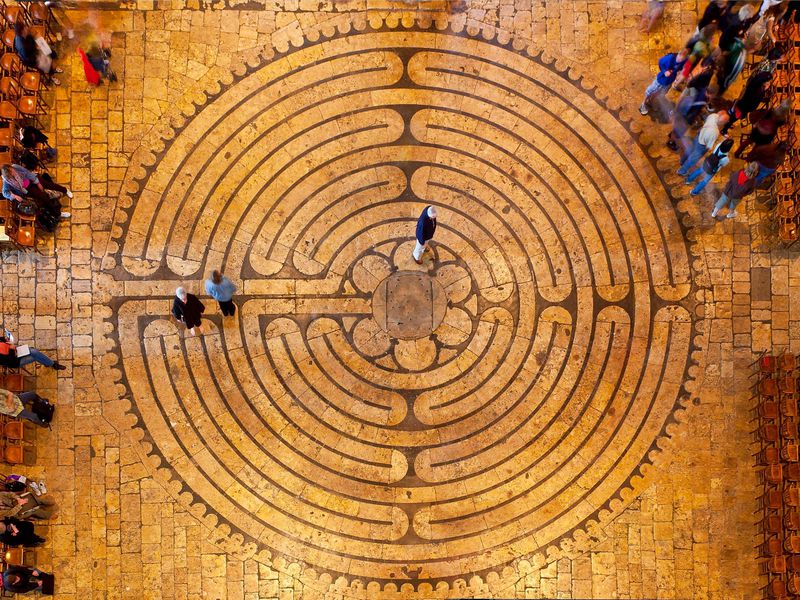 As an aside, Chartres also contains a circular, 7-circuit labyrinth.  https://www.thecultureconcept.com/walking-a-labyrinth-chartres-cathedral-to-centennial-park