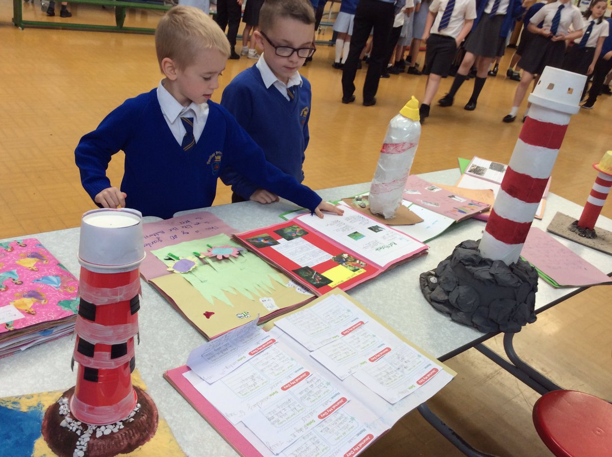 Parkfield's tweet image. Children are enjoying lokking at each other&apos;s #LearningLog homework this morning.