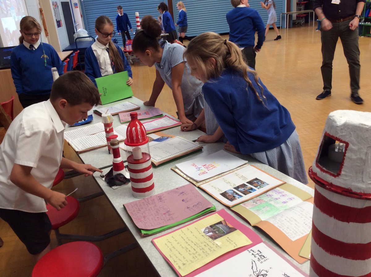 Parkfield's tweet image. Children are enjoying lokking at each other&apos;s #LearningLog homework this morning.