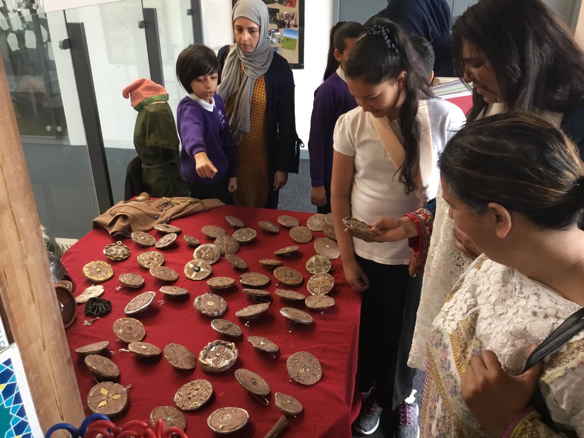 A lovely way to end the year: year 5 showcase sharing their learning from their Anglo-Saxon topic with family members.